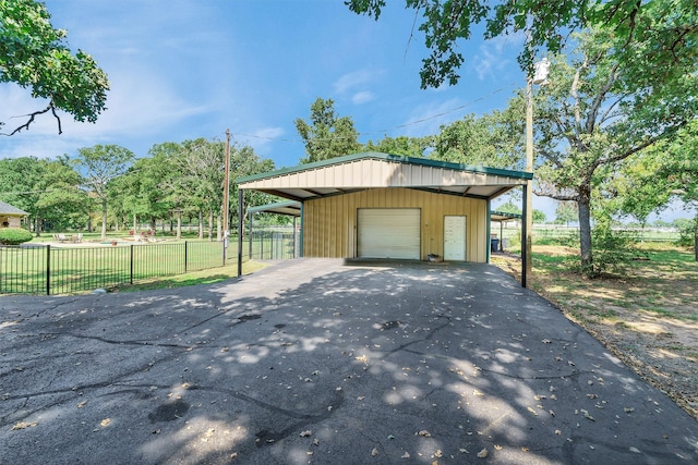 garage with a lawn