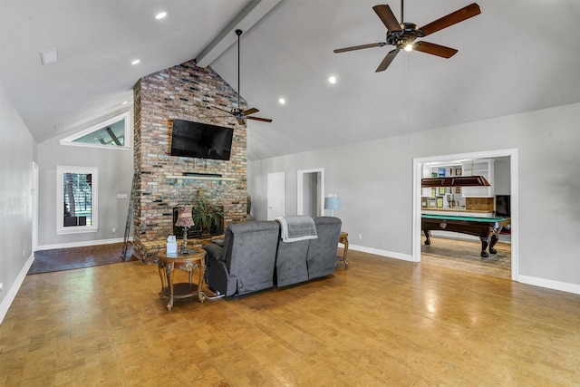 living room featuring ceiling fan, beam ceiling, high vaulted ceiling, a fireplace, and billiards