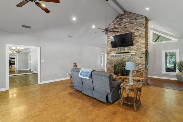 living room featuring ceiling fan with notable chandelier, beam ceiling, wood-type flooring, and high vaulted ceiling