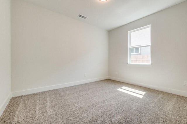 empty room featuring carpet floors