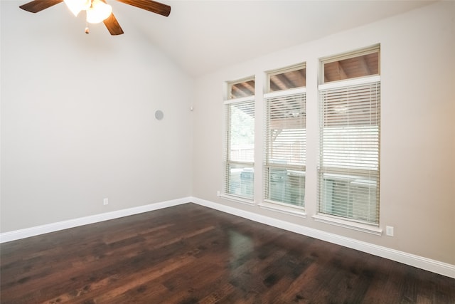 unfurnished room with vaulted ceiling, dark wood-type flooring, and ceiling fan