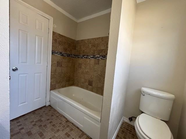 bathroom featuring toilet and crown molding