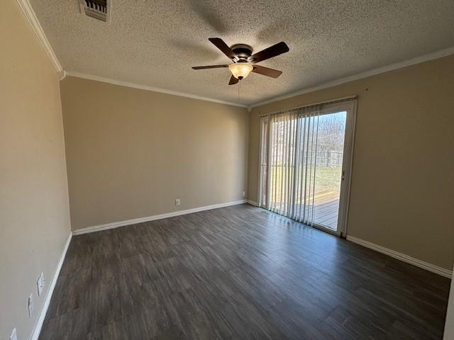 bathroom with crown molding and toilet