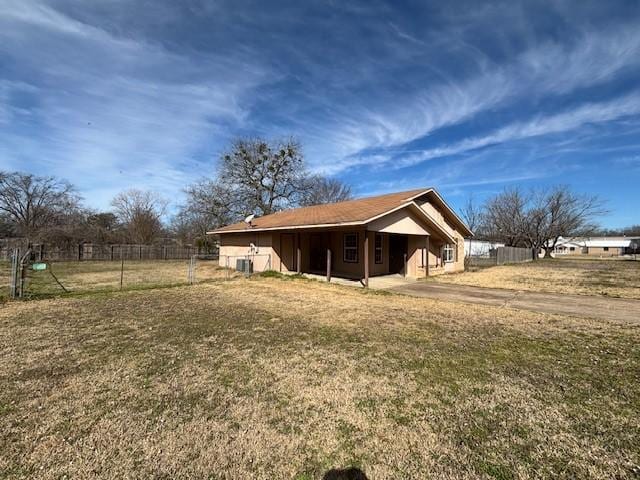 back of property with fence