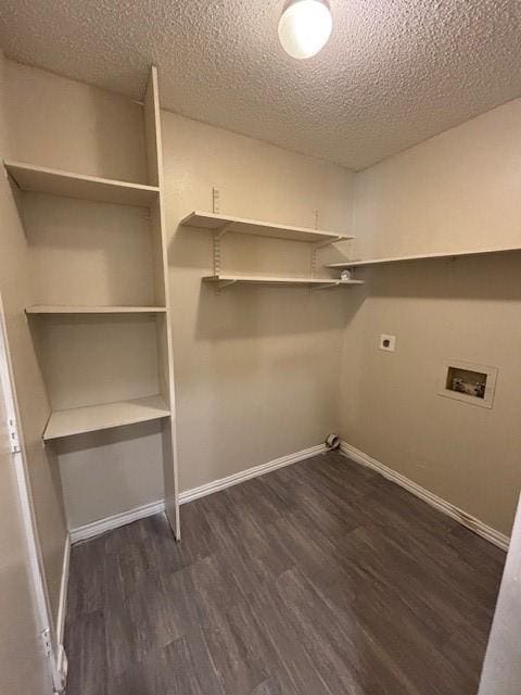 washroom with laundry area, dark wood-type flooring, washer hookup, baseboards, and electric dryer hookup