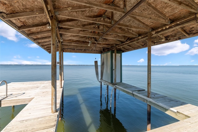 dock area featuring a water view