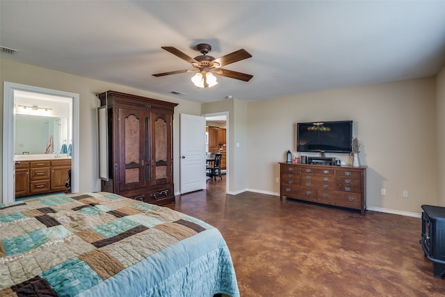 bedroom featuring ceiling fan and ensuite bathroom