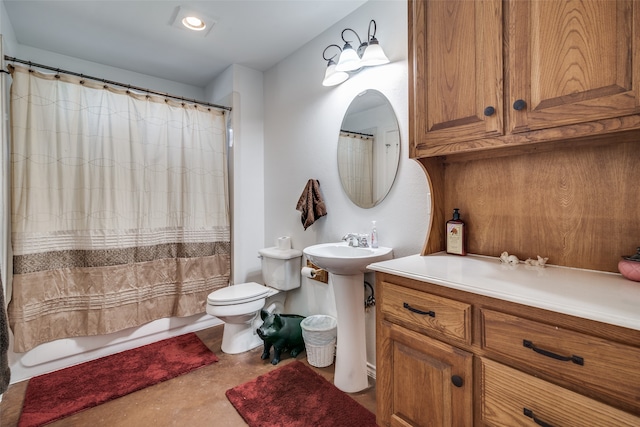 full bathroom with shower / bath combination with curtain, sink, and toilet