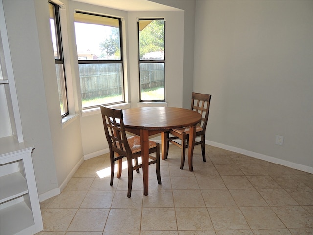 tiled dining space with plenty of natural light