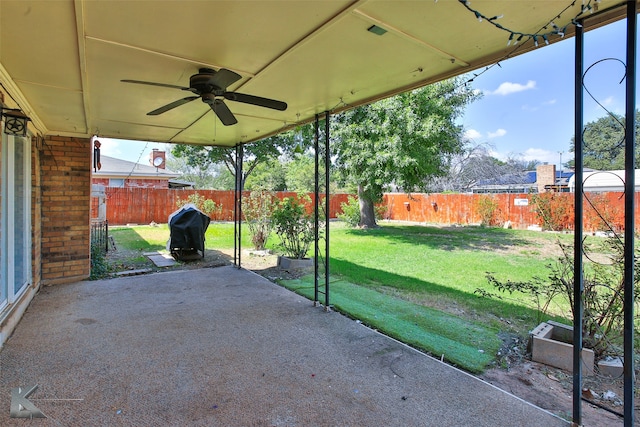 view of patio featuring ceiling fan and grilling area