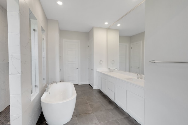 bathroom featuring vanity, tile patterned flooring, and independent shower and bath