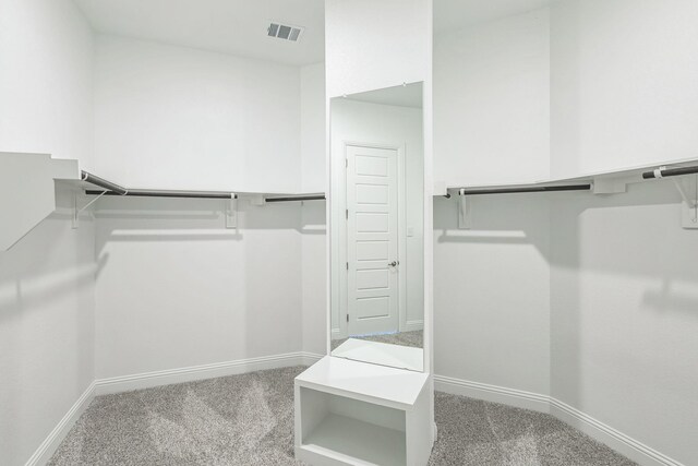 bathroom featuring tile patterned floors, vanity, and plus walk in shower