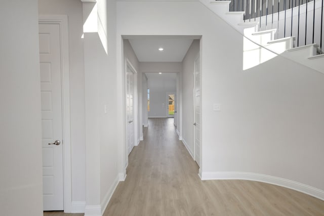 hall featuring light hardwood / wood-style floors