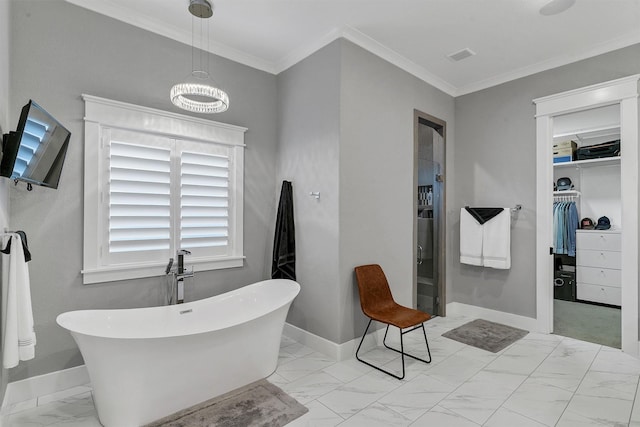 bathroom featuring crown molding and independent shower and bath