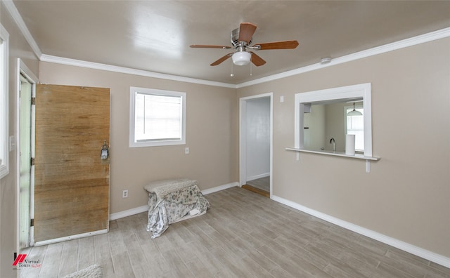 interior space featuring light hardwood / wood-style flooring, ceiling fan, and plenty of natural light