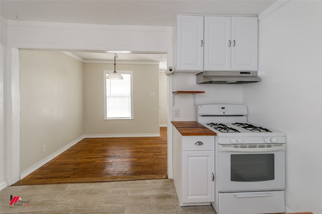 kitchen featuring white cabinets, decorative light fixtures, white range with gas stovetop, light wood-type flooring, and butcher block counters