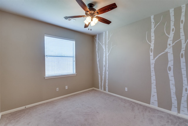 interior space featuring carpet floors and ceiling fan