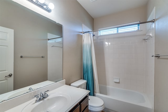 full bathroom featuring shower / bath combo, vanity, and toilet