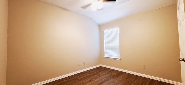 unfurnished room featuring a healthy amount of sunlight, wood-type flooring, lofted ceiling, and ceiling fan