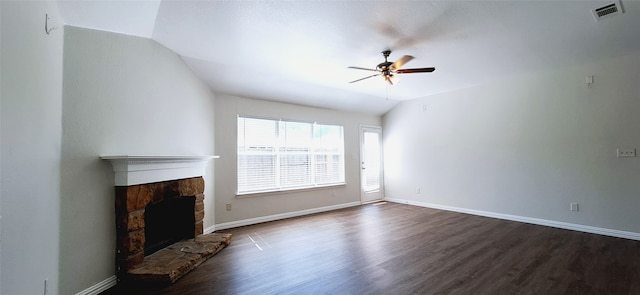 unfurnished living room featuring ceiling fan, a fireplace, vaulted ceiling, and dark hardwood / wood-style flooring