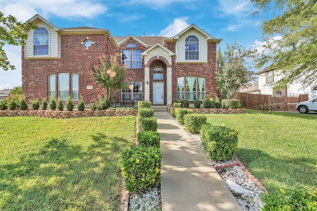 view of front of home featuring a front yard