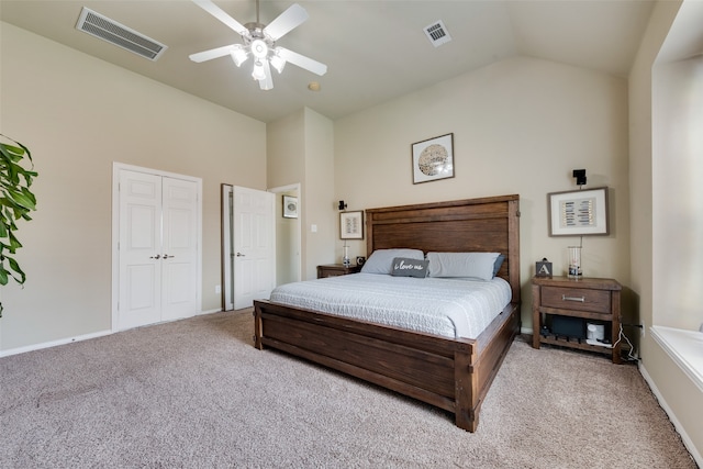 carpeted bedroom featuring ceiling fan and high vaulted ceiling