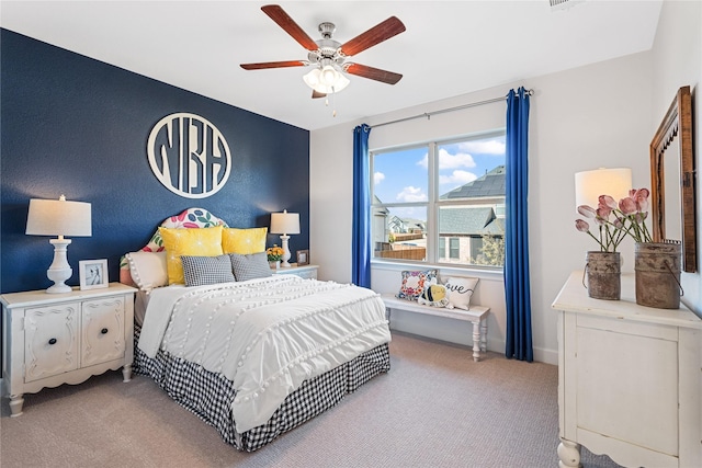 carpeted bedroom featuring ceiling fan