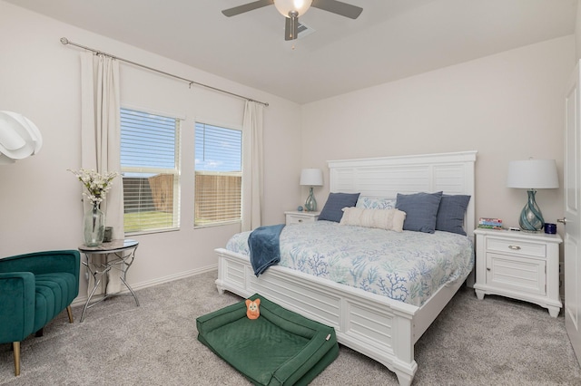 bedroom with light colored carpet and ceiling fan