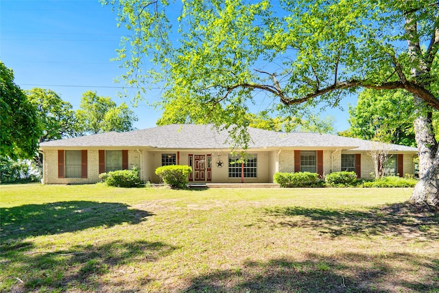 ranch-style house featuring a front lawn