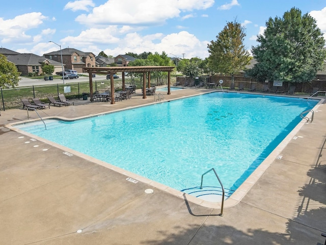 view of pool with a patio area