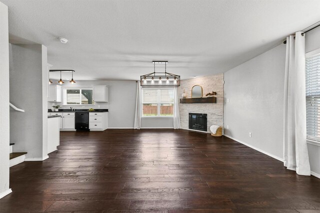 dining room featuring a chandelier and dark wood-type flooring