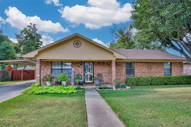 single story home with a front lawn and covered porch