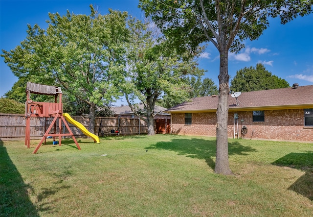 view of yard with a playground