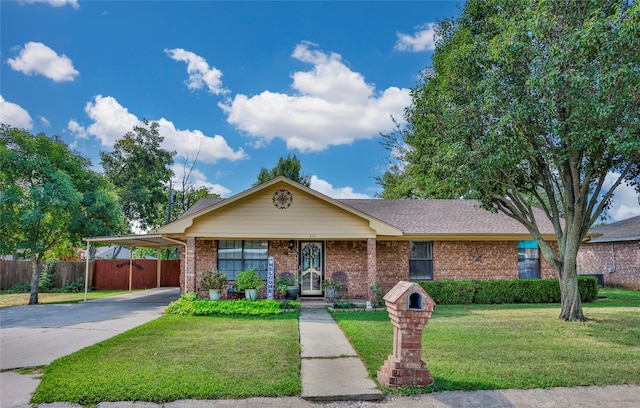 single story home with a front yard