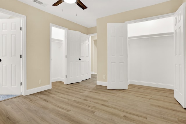 unfurnished bedroom featuring light wood-type flooring and ceiling fan