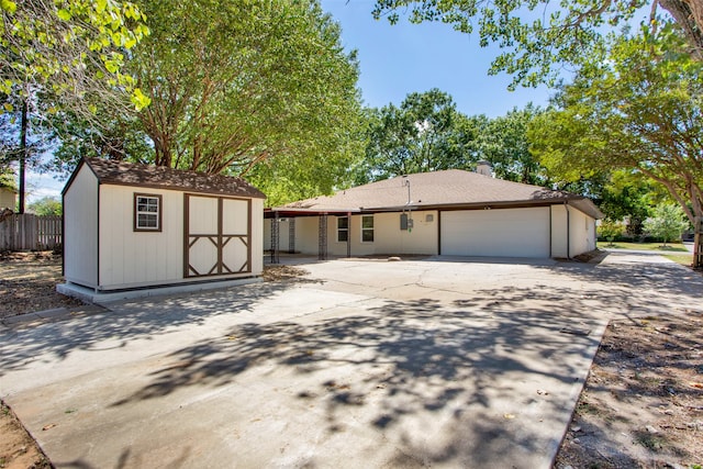 view of front facade featuring a storage shed