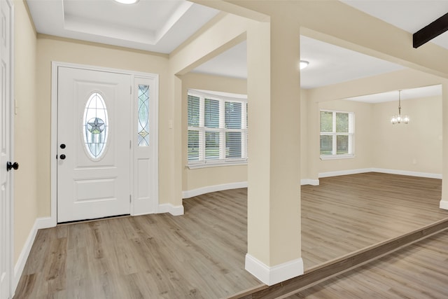 entrance foyer with light wood-type flooring and plenty of natural light