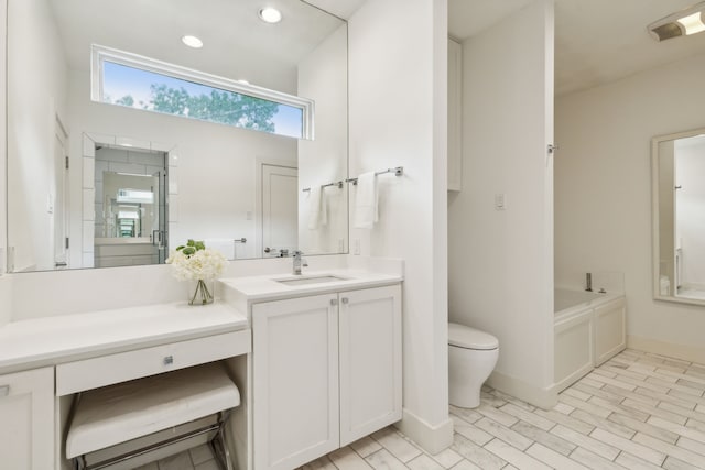 full bathroom featuring wood-type flooring, vanity, toilet, and plus walk in shower