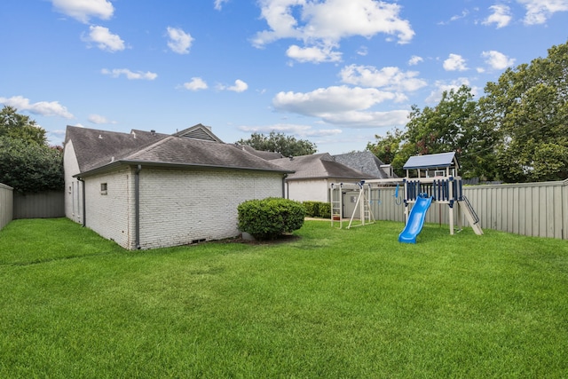 view of yard featuring a playground