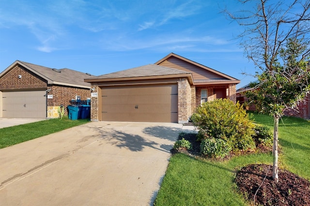 single story home featuring a front lawn and a garage