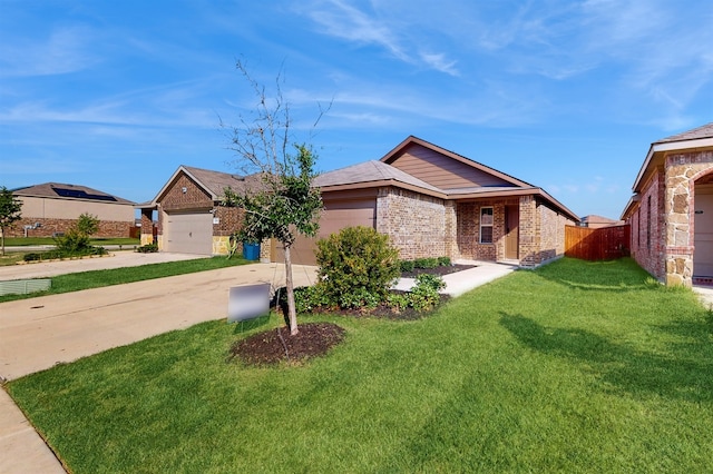 single story home featuring a front yard and a garage