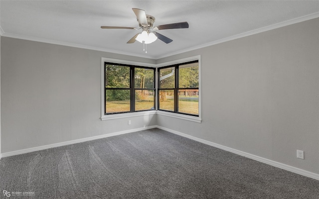 carpeted empty room with ceiling fan and ornamental molding