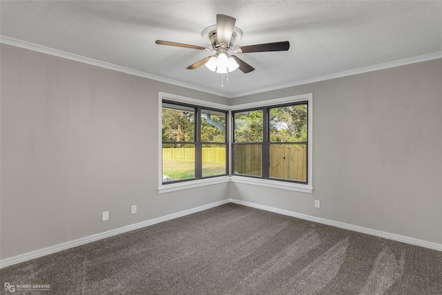 carpeted spare room with crown molding, ceiling fan, and a textured ceiling