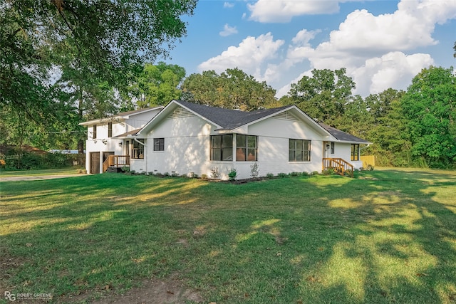 view of property exterior with a lawn