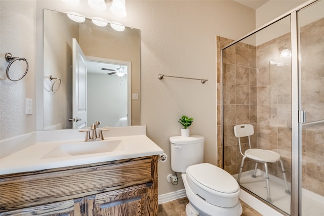 bathroom featuring walk in shower, vanity, and toilet