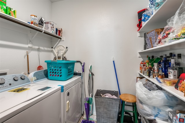 laundry room with washer and dryer