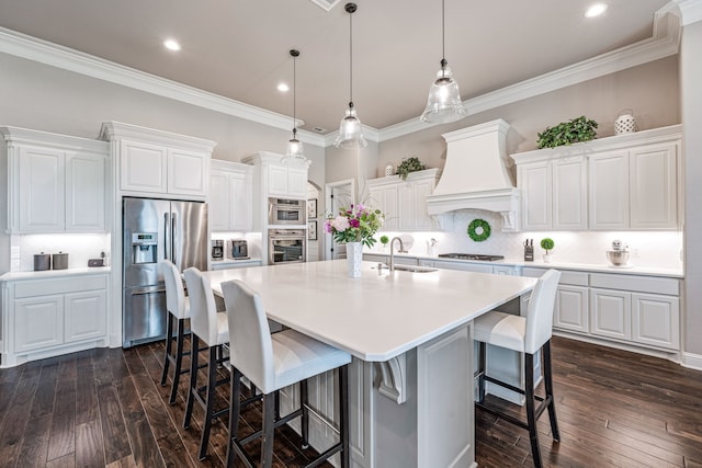 kitchen featuring stainless steel appliances, custom exhaust hood, backsplash, and dark wood finished floors