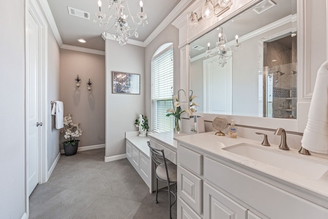 bathroom with tiled shower, vanity, a notable chandelier, crown molding, and tile patterned floors