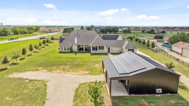 birds eye view of property featuring a rural view