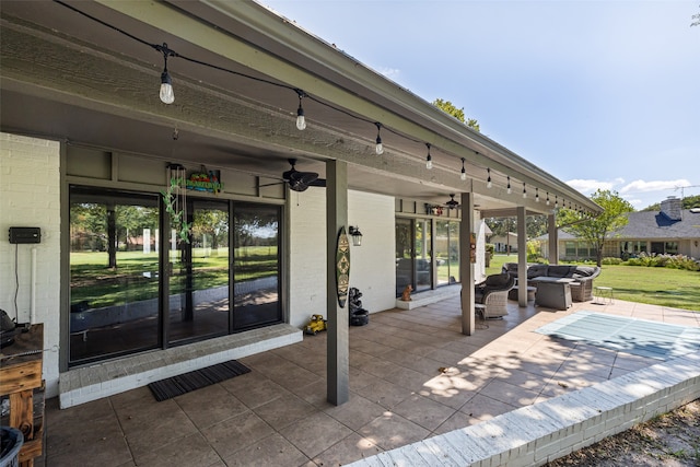 view of patio featuring an outdoor living space and ceiling fan